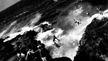 Boys jumping off the Malecn.
